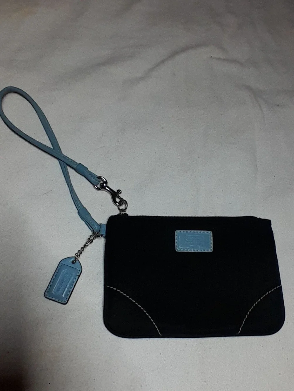 Black Wristlet Clutch with Light Blue Accents